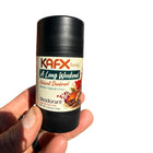 A Long Weekend deodorant held in hand